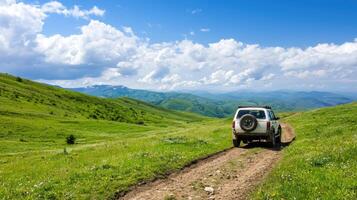 Off-road car on mountain dirt road, scenic landscape view, summer adventure photo