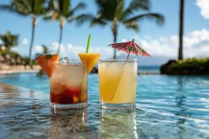 Tropical cocktails by resort pool with ocean view photo