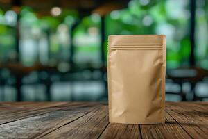 Brown pouch mockup on wooden table in cafe, ideal for packaging design photo