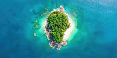 Aerial view Forested island, clear water, waves, scenic. Tourism, solitude photo