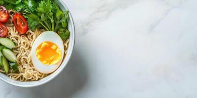 Noodle bowl on table. Healthy soup with vegetables. Restaurant food photo