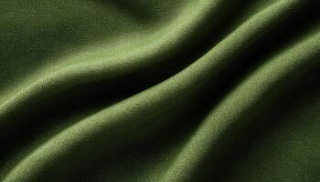 Texture background of velours green fabric close up photo