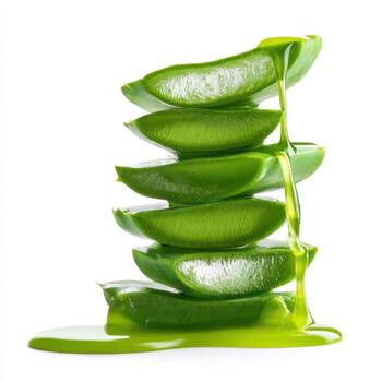 Stack of Aloe with gel dripping isolated on white background. photo