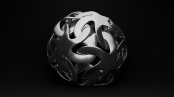 A silver ball with a design on it photo