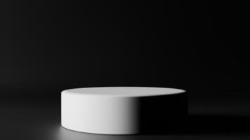 A white round object sitting on a black surface photo