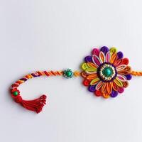 A colorful rakhi with a flower on it photo