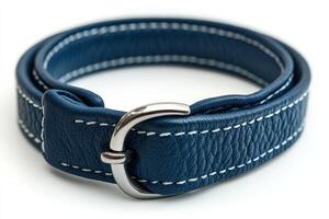 A blue leather belt with white stitching photo