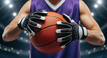 Male basketball player in a purple jersey holding a basketball on an indoor court photo