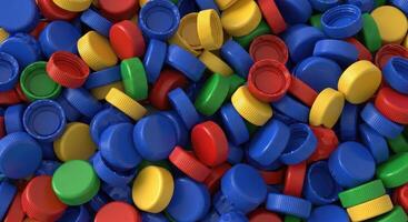 Colorful plastic bottle caps background showing recycling and environmental issues photo