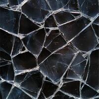 Intricate shattered glass pattern with sharp, dangerous edges photo