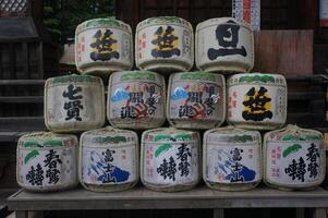 Fujiyoshida Sengen Shrine, Yamanashi, Japan - May26th., 2025 Sake Barrels Displayed photo