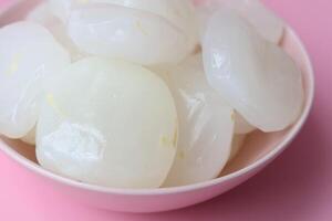 Closeup view toddy palm fruit in bowl photo