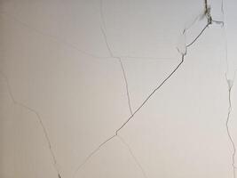 Diagonal cracks or Structural Cracks on wall building inside the building photo