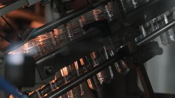 Multiple preforms entering heating tunnel video