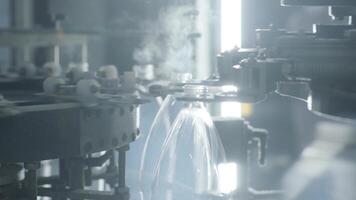 PET preforms illuminated inside heater tunnel video