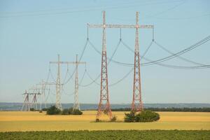 Modern Energy Distribution Towers Framed by a Vast Sky photo