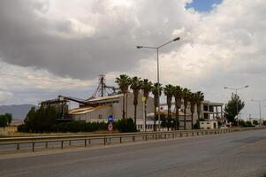 Old Grain Elevator Structure in Rural Cyprus Landscape photo