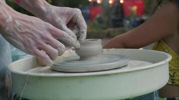 Hands Sculpting Clay Bowl on Pottery Wheel at Workshop video