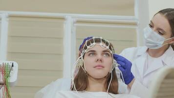 Front view of woman wearing EEG net video
