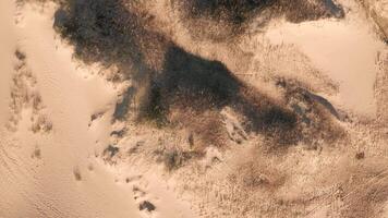 High-resolution drone image of dune patterns with wind erosion marks. video