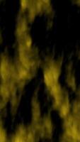 A deep abstract background filled with a mysterious yellow smoke effect against a dark base. The flowing patterns create an artistic and atmospheric visual. video
