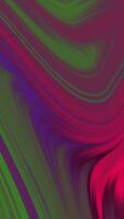 A vibrant abstract background with swirling colors in shades of green, purple, pink, and blue. The smooth, fluid motion of the colors creates a dynamic and artistic design. video
