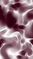 A gentle abstract background with soft fluid wave patterns in purple, pink, and white hues. The smooth, flowing design creates a visually appealing and artistic texture. video