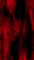 A dramatic abstract background filled with intense red smoke patterns against a dark base. The flowing design creates an artistic and moody visual effect. video