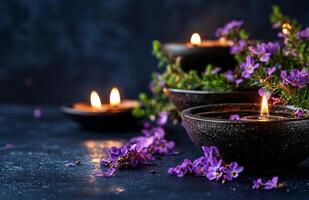 Beautiful Lilac Bouquet With Candles and Olive Oil on a Dark Textured Surface. photo