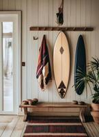 Stylish Coastal Living Room With Bohemian Decor and Surfboard on Display. photo