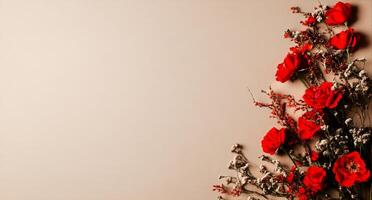 Bright Red Roses and Delicate Flowers Arranged on a Beige Background for a Decorative Display photo
