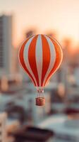 Colorful Hot Air Balloon Floating Above a City at Sunset Capturing Serene Moments From Above photo