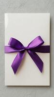 Elegant Envelope With Purple Ribbon Bow for Special Occasion or Event. photo