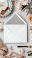 Delicate Stationery Arrangement on a Soft, Neutral Surface With Floral Accents and Elegant Details photo