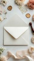 Delicate Stationery Arrangement on a Soft, Neutral Surface With Floral Accents and Elegant Details. photo