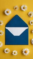 Envelope Surrounded by Daisies on Bright Yellow Background Creating a Cheerful Atmosphere for Messages. photo