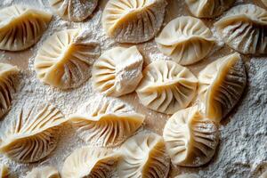 Dumplings Prepared on a Floured Surface in a Cozy Kitchen Setting During the Morning photo