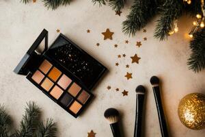 Makeup Palette and Brushes Arranged With Decorations in a Festive Atmosphere During the Holiday Season. photo