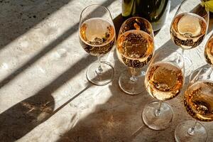 Sparkling Wine Served in Elegant Glasses During Afternoon Gathering With Natural Light photo