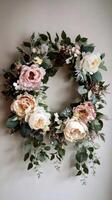 Decorative Floral Wreath With Peonies and Greenery for Wall Decor in Sunny Indoor Setting photo