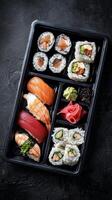 Delicious Sushi Bento Box With Fresh Ingredients Served on Wooden Table. photo