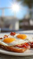 Enjoying Breakfast of Eggs and Bacon on Toasted Bread in a Sunny Outdoor Setting photo
