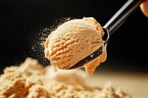 Creamy Vanilla Ice Cream Scoop on a Sandy Dessert Base With a Spoon Ready to Serve. photo