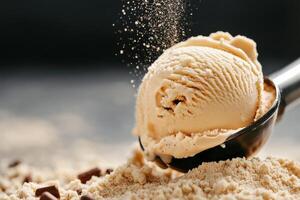Creamy Coffee Ice Cream Served With a Scoop and Crumbles in an Elegant Setting. photo