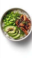 Healthy Rice Bowl With Chicken, Avocado, Edamame, and Sesame Seeds for a Nutritious Meal photo
