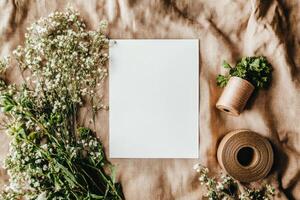 Crafting With Flowers and Twine on a Textured Fabric Background Ready for Creative Projects photo