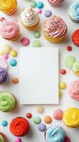 Colorful Cupcakes Surrounding a Blank Card on a Festive Table During a Celebration. photo