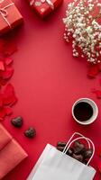 Creative Valentines Day Display With Gifts, Chocolates, and Decorations on Red Background. photo