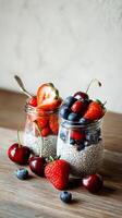 Fresh Fruit and Chia Seed Parfaits Arranged in Jars on a Wooden Table. photo