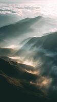 Breathtaking Sunset Above Mountains and Clouds in a Remote Landscape. photo
